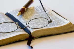 open Bible pen & glasses